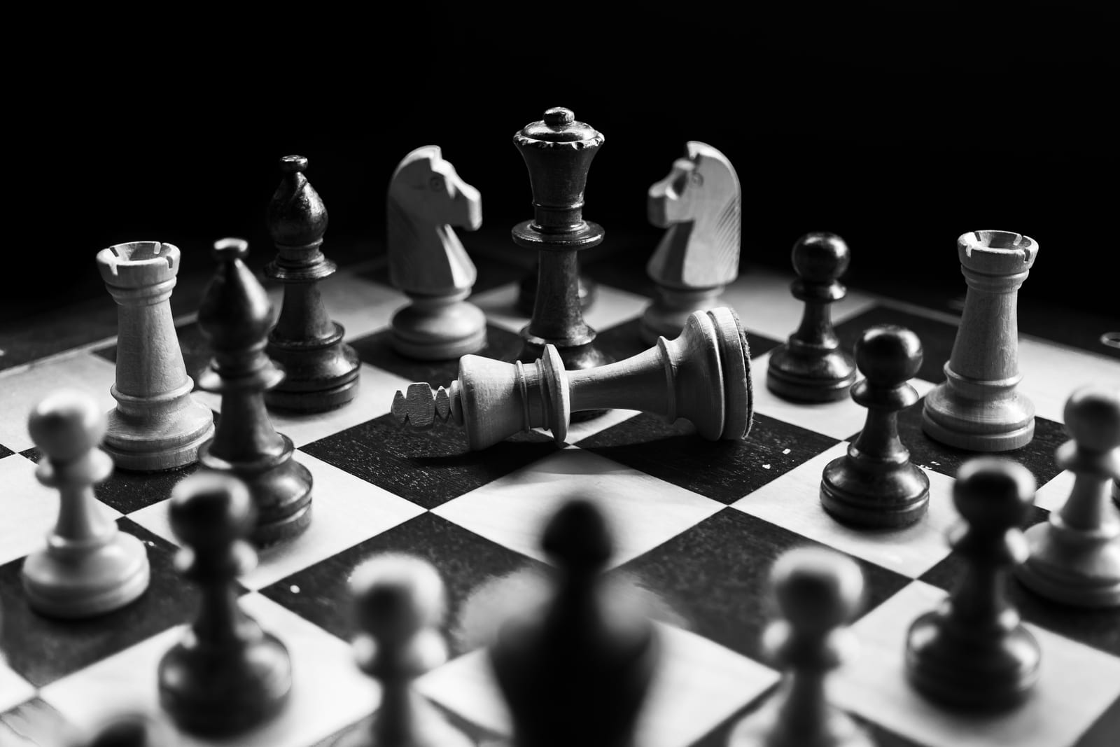 Chess pieces on a tournament board, representing the precise rapid calculation Abdusattorov brings to every game